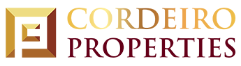Cordeiro Property logo featuring stylized text in gold and maroon colors.